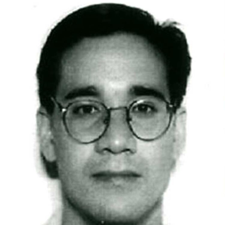 Andrew Phillip Cunanan wearing eyeglasses.