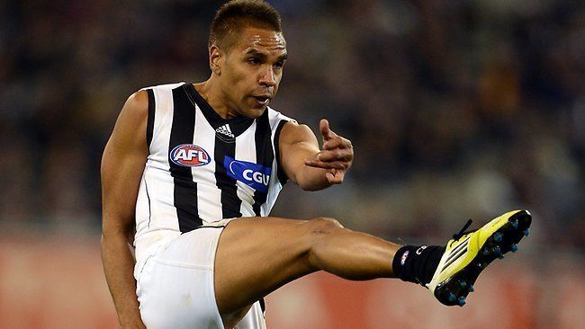 Andrew Krakouer Nathan Buckley backs in small Magpie Andrew Krakouer but