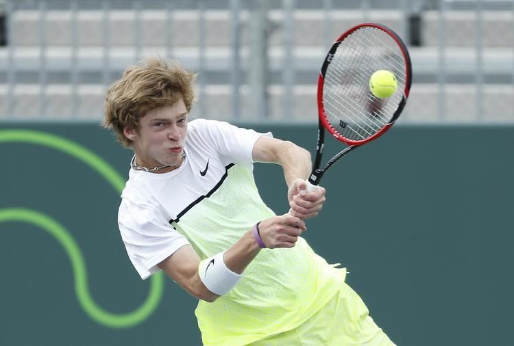Andrey Rublev (tennis) Andrey Rublev of Russia returns the ball against John