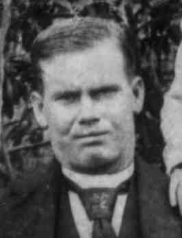William Sherman Albury wearing a coat, long sleeves, vest and necktie