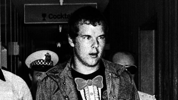 Andy Albury wearing a jacket and t-shirt