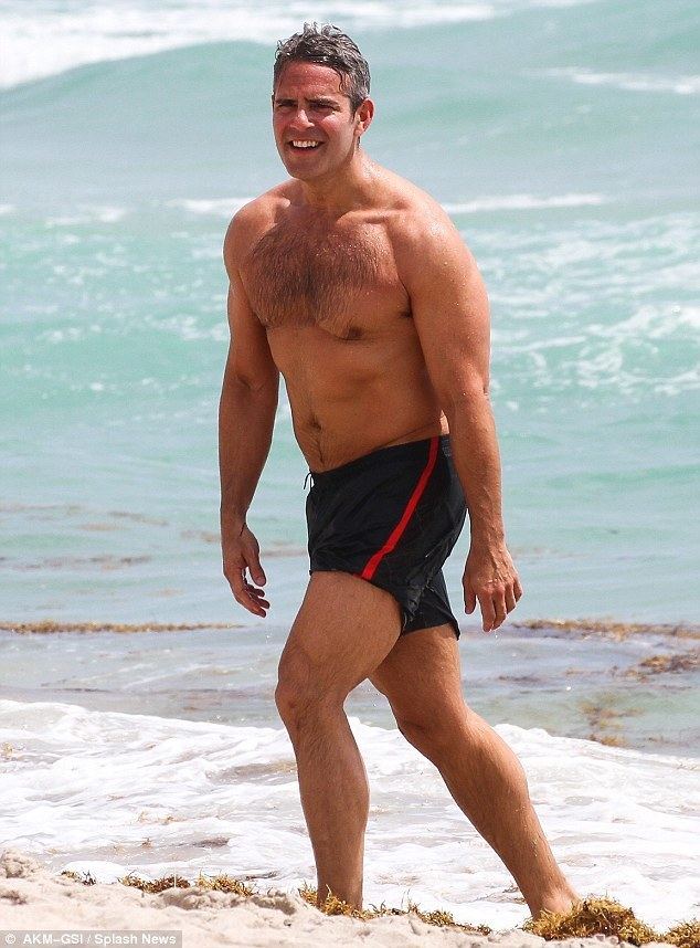 Andy Cohen (television personality) Andy Cohen 46 flashes newly ripped abs and biceps and