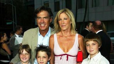 Andy Mill and Chris Evert with three children