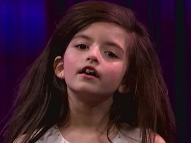 Angelina Jordan while singing