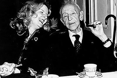Annabelle Whitestone laughing while looking at the Polish American classical pianist Artur Rubinstein