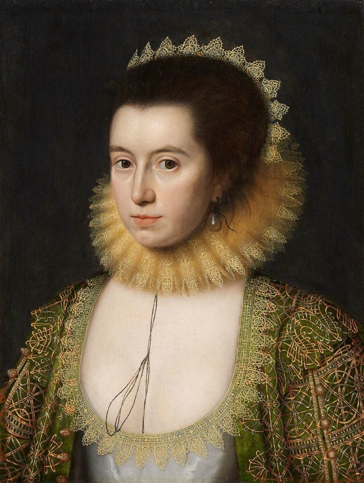 Anne Hathaway (1555/56 – 6 August 1623) was the wife of William Shakespeare, the English poet, playwright, and actor. Anne with a serious face, wearing a crown, earrings, and a green and yellow ancient dress.