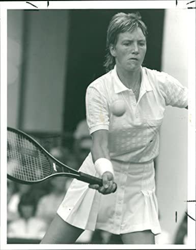 Anne Hobbs while playing tennis (black and white photo)