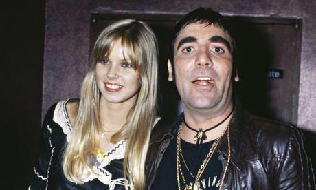 Annette Walter-Lax in her black and white outfit and Keith Moon wearing black leather jacket, black t-shirt and necklace