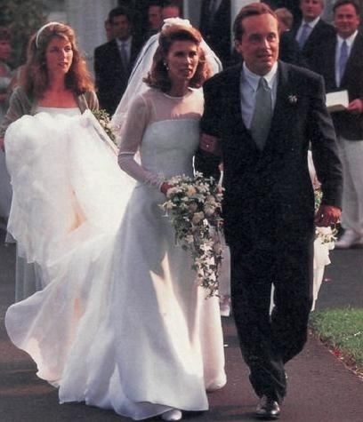 Carole Radziwill holding Anthony Stanislas Radziwill's arms during their wedding day