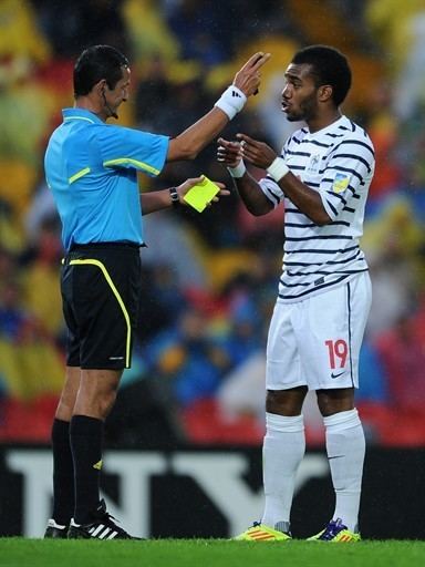 Antonio Arias (footballer) Alexandre Lacazette R of France argues with referee Antonio Arias
