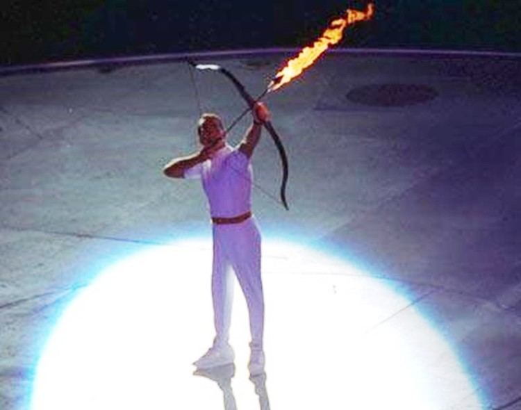 Antonio Rebollo The Olympic flame cauldron was lit by the Paralympic archer Antonio