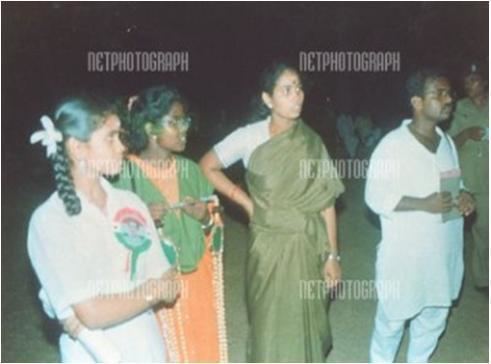 Taken by freelance photographer Hari Babu, who died in the blast at the venue of Rajiv Gandhi’s May 21, 1991 election rally in Sriperumbudur. The woman waiting with the garland is Dhanu, the suicide bomber. Flanking her are Latha Kannan and her daughter Kokila. The man in the photograph is Sivarasan