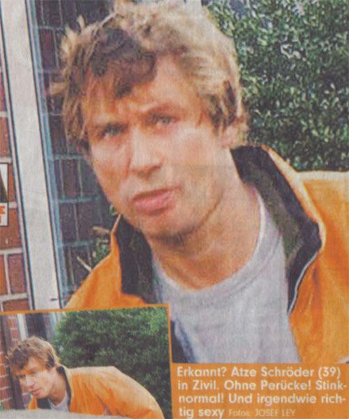 An old photo of Atze Schröder wearing an orange jacket