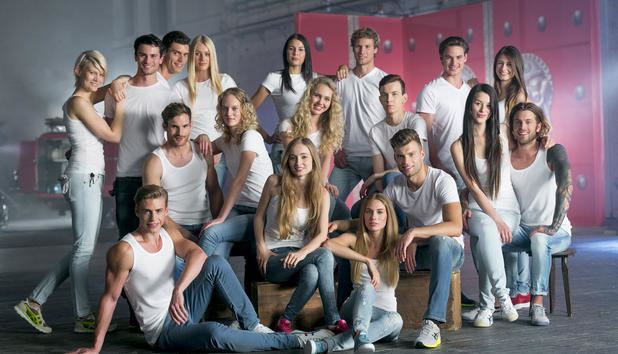 Eighteen aspiring models compete for the title of Austria's Next Topmodel. They are all smiling while wearing white shirts, denim pants, and rubber shoes
