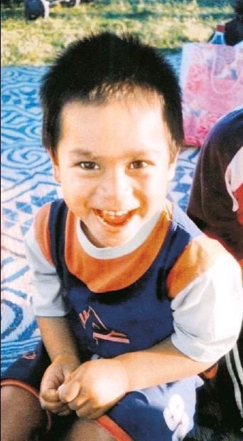 Ngatikaura Ngati with a smiling face and wearing a colorful shirt.