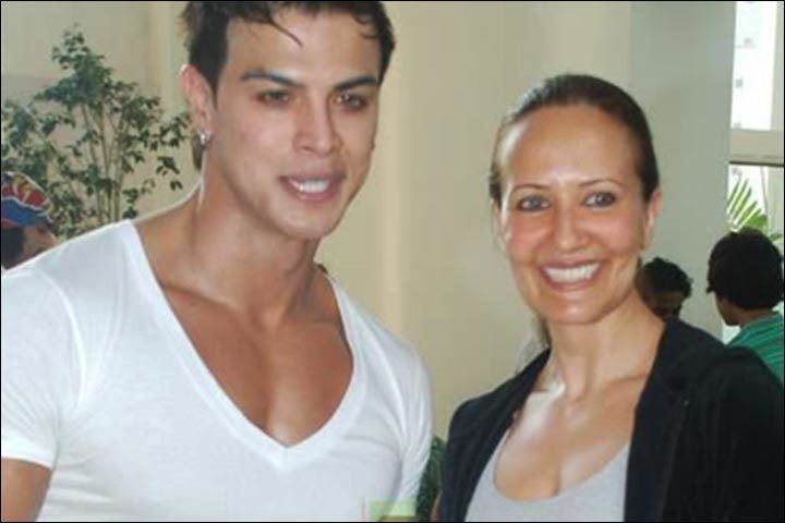 Sahil Khan wearing white shirt and Ayesha Dutt in her gorgeous smile while wearing black coat and gray inner top