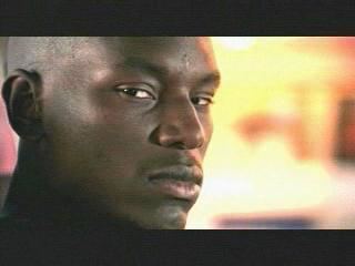 Tyrese Gibson looking at something from a scene in Baby Boy, 2001.