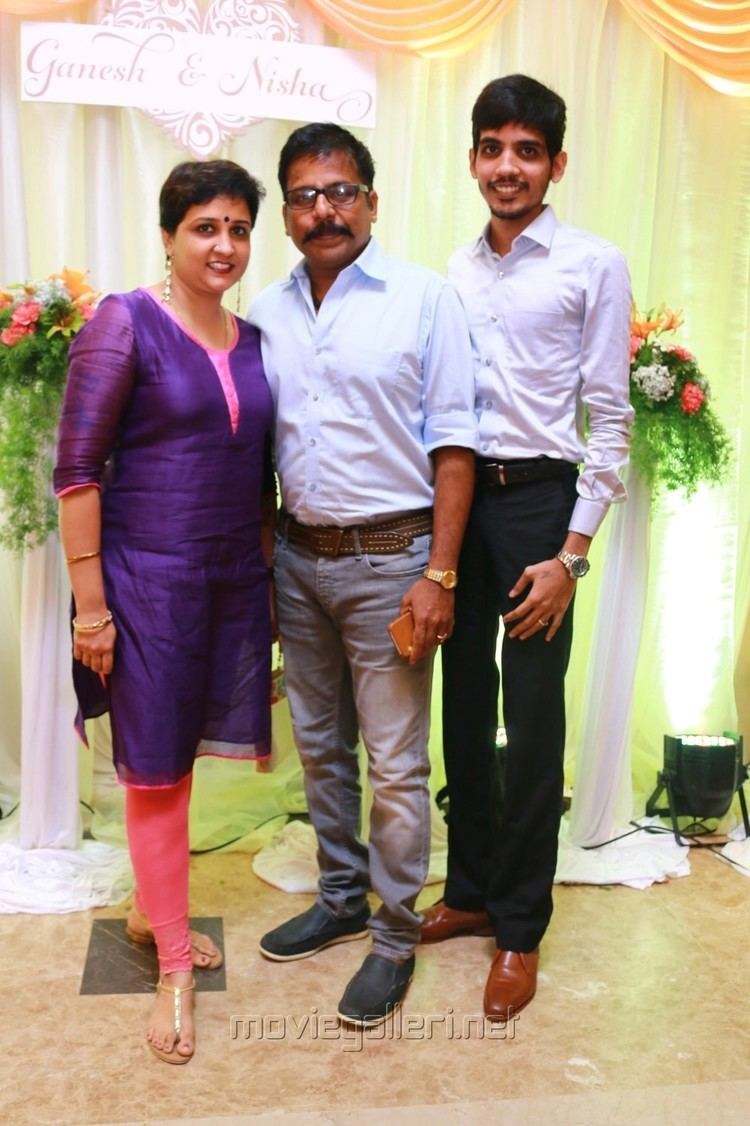 Badava Gopi with his son and wife at Ganesh Venkatraman and Nisha Krishnan's wedding reception party