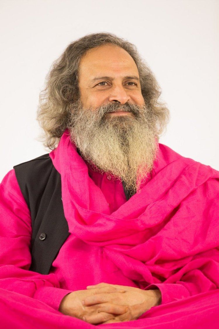 Baljit Singh (Sant Mat) wearing a black and pink long-sleeved shirt