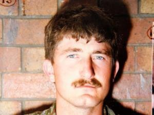 Barend Strydom with a serious face and a mustache.