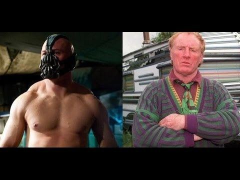 On the left is Tom Hardy acting as "Bane" in the film "The Dark Knight Rises" year 2012. On the right is Bartley Gorman standing while arms crossed
