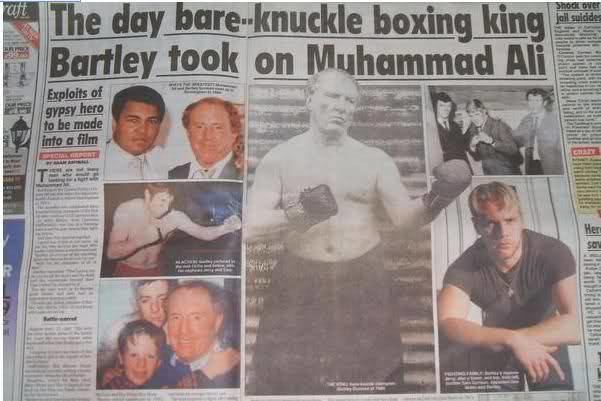 Bartley Gorman in a punching pose, shirtless and just wearing shorts and boxing gloves and featured in a newspaper
