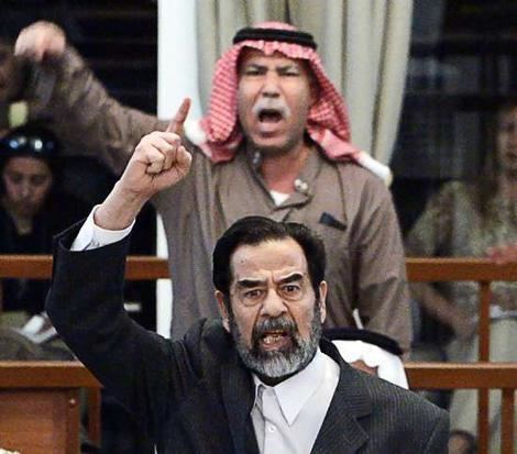 Barzan Ibrahim al-Tikriti Saddam39s halfbrother dragged from court World smhcomau