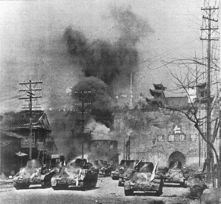 Battle of Nanking Japanese Type 94 tankettes attacking at the Gate of China during the