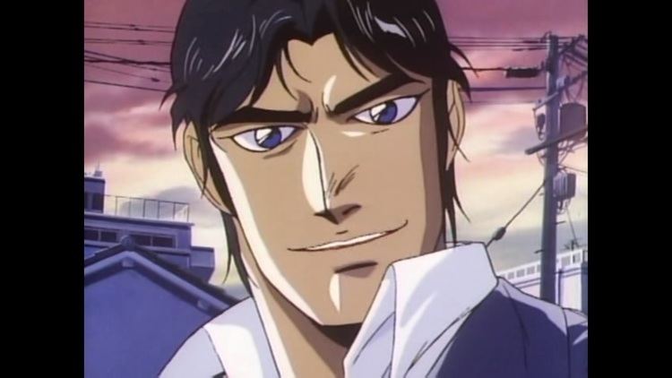 A man smiling with a house in the background, a clip from a 1986 animation movie “Battle Royal High School”, he has black hair, wearing a white polo under a blue coat