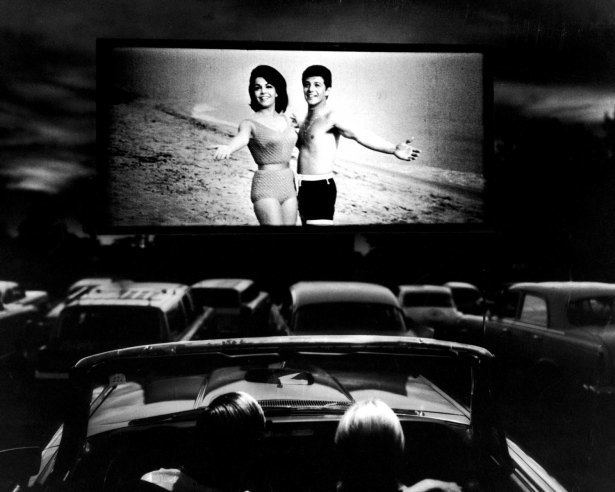 Beach Blanket Bingo movie scenes Annette Funicello and Frankie Avalon in a scene from Beach Blanket Bingo shown at a drive in movie theater in Florida 1965