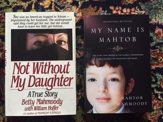 On the left, is the book "Not Without My Daughter" by Betty Mahmoody features the eyes of a lady. On the right, the book "My Name is Mahtob" by Mahtob Mahmoody features an innocent boy smiling.