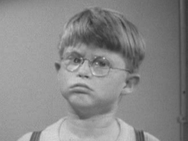 Billy Laughlin with sad face while wearing eyeglasses