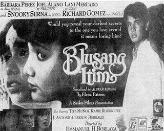 The movie poster of Blusang Itim (1986), at the top is the cast named from left “ Barbara perez, Joel Alano,  Lani Mercado, Snooky Serna, Richard Gomez” from left, Snooky Serna is sad, has black hair, dark skin, thick eyebrows, large teeth and a mole in forehead, 2nd from left, Snooky Serna is serious, looking to her left, has black hair, light skin, in the middle is a question “Would you reveal your darkest secrets to the one you love even if it means losing him?” and the title “Blusang Itim” at the right, Richard Gomez is serious, standing facing his right side, looking to his left, has black hair wearing a white long sleeve polo with bowtie.