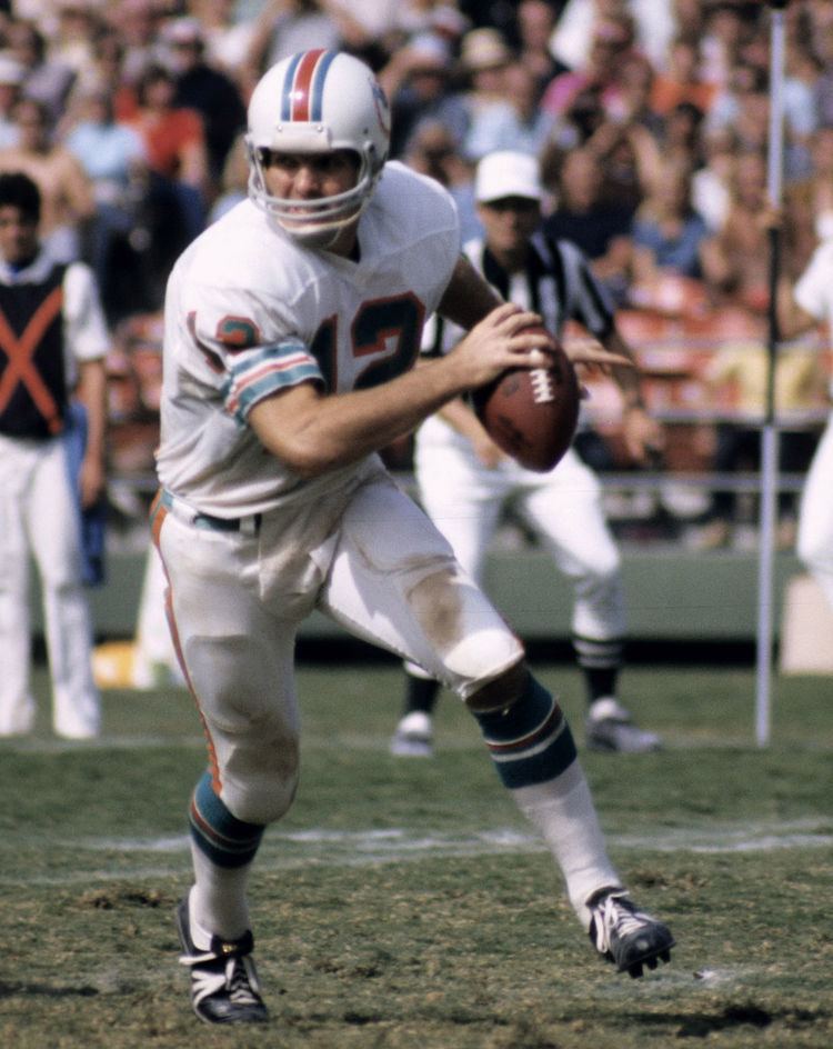 Baltimore Colts defensive end Ron Fernandes files into Miami Dolphins  quarterback Bob Griese during the second period of their NFL game in  Baltimore, Oct. 10, 1977. (AP Photo/William Smith Stock Photo - Alamy