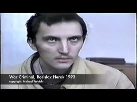 Borislav Herak' s serious face while wearing beige jacket