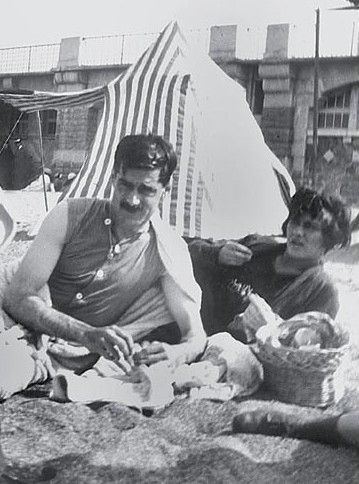 Arthur Edward "Boy" Capel with Coco Chanel lying on a beach.