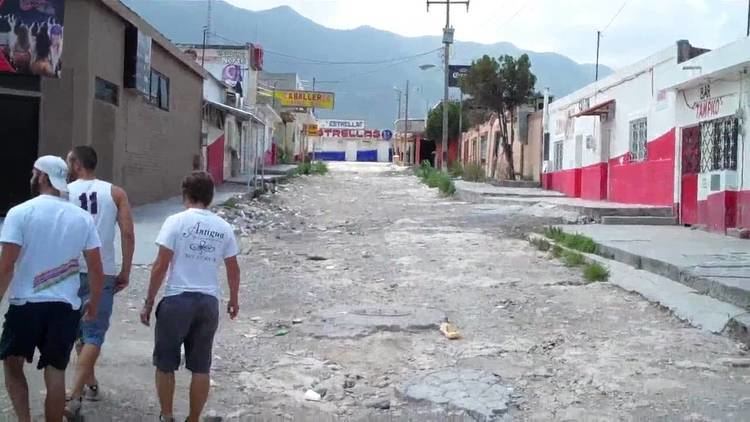 A group of people walking in Boy's Town, Nuevo Laredo