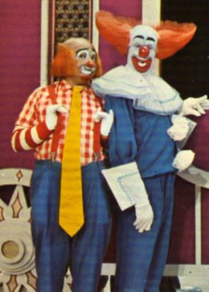 Cooky (Roy Brown) smiling with Bozo the Clown (Bob Bell) on WGN-TV Chicago's Bozo's Circus in 1976.