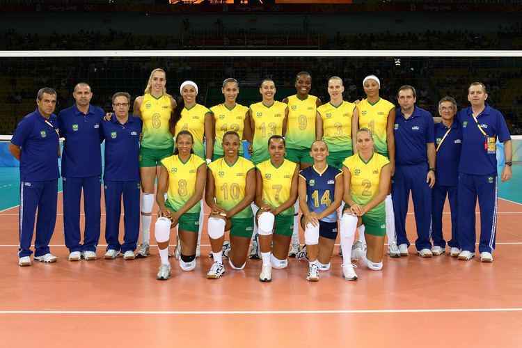 Brazil women's national volleyball team smiling together with six men