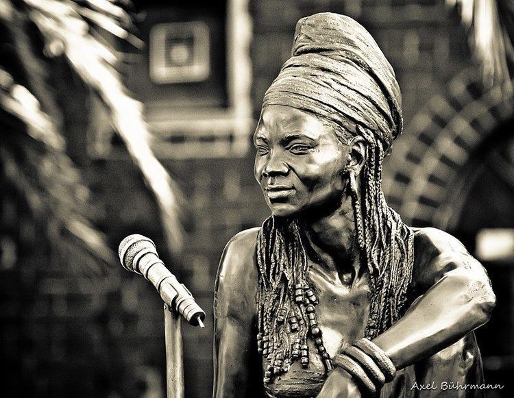 Angus Taylor's life-size bronze sculpture of Brenda Fassie outside Bassline, a music venue in Johannesburg. The Sunday Times commissioned the tribute, which was installed in March 2006.