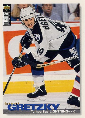 A magazine cover featuring Brent Gretzky playing hockey