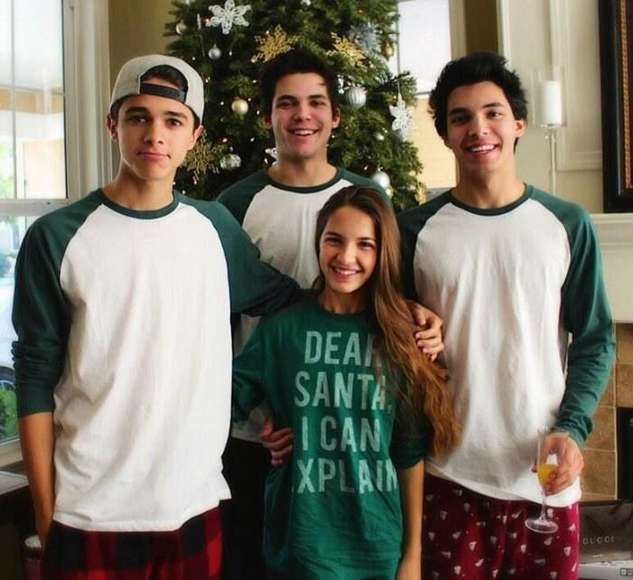 Brent Rivera smiling and embracing her sister (Lexie Rivera) by the shoulder together with his two other brothers Blake and Brice