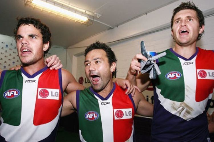 Brett Peake Fremantle captain Peter Bell c celebrates with Brett