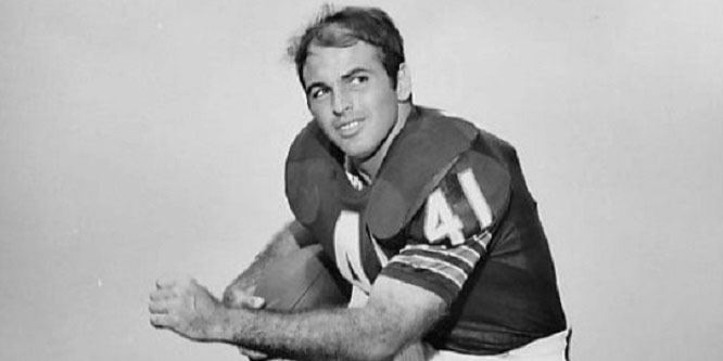 Brian Piccolo holding the ball with his right hand and wearing  a jersey numbered 41