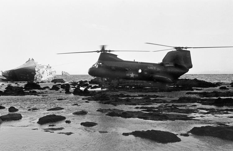 BRP Datu Kalantiaw (PS-76) A left side view of a CH46A Sea Knight helicopter on the rocks near