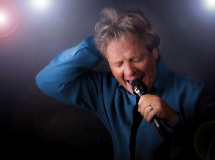 Bryan Duncan Eyes Close Blue Shirtjpg