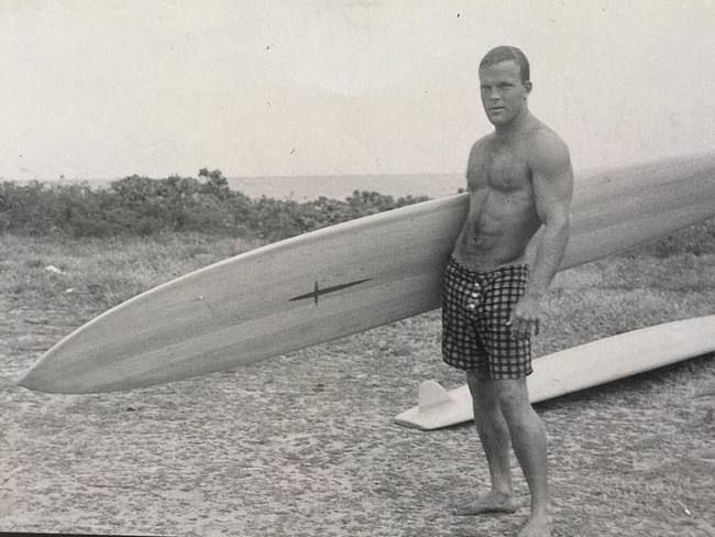 Buzzy Trent Buzzy Trent getting ready to surf forty foot waves in 1955
