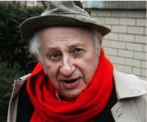 Claiborne Paul Ellis (C. P. Ellis) wearing a hat and a red scarf.