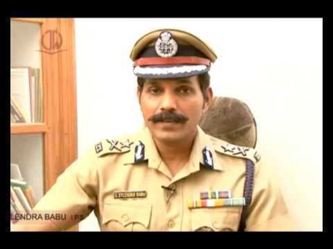 C. Sylendra Babu wearing police officer uniform