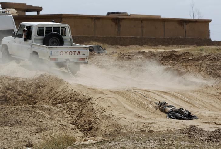 Camp Speicher Exhumation of Iraq39s Camp Speicher victim mass graves begins Reuters